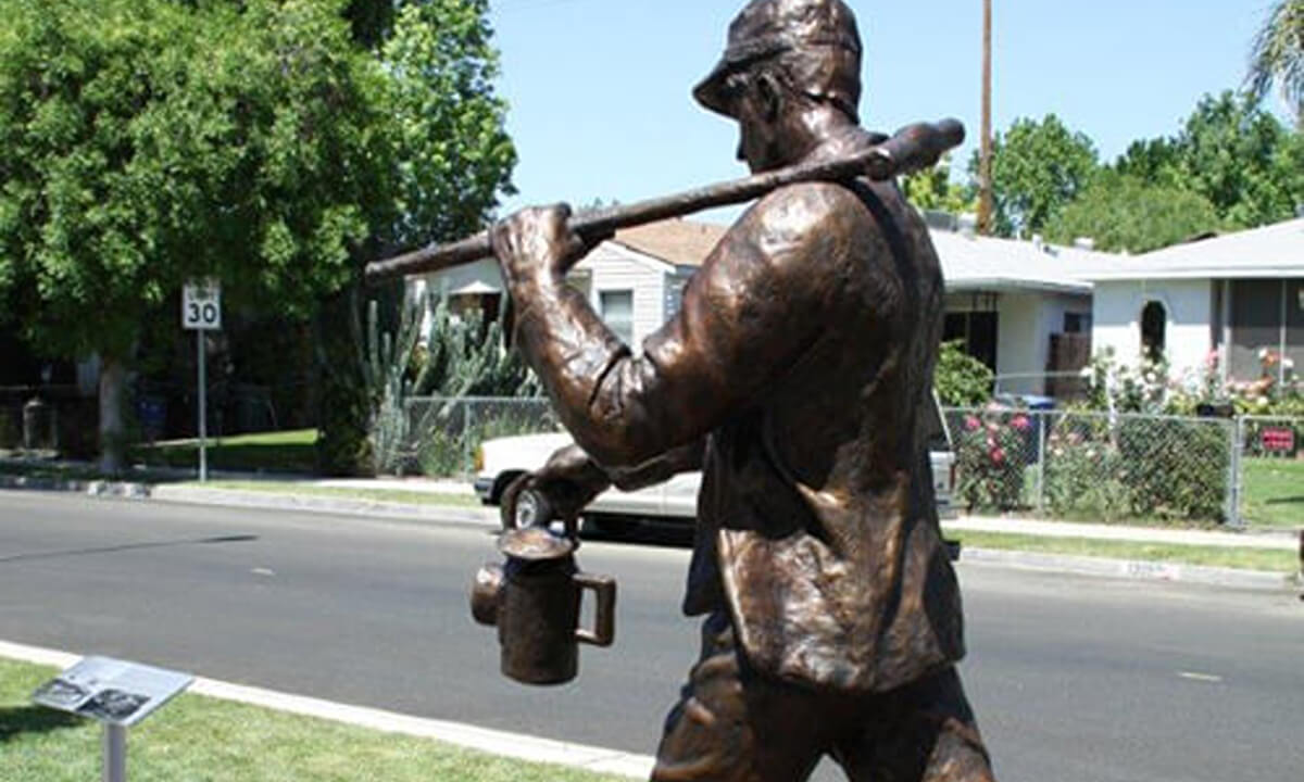 Capturing History in a Monumental Railroad worker Bronze Sculpture – “Trackwalker”